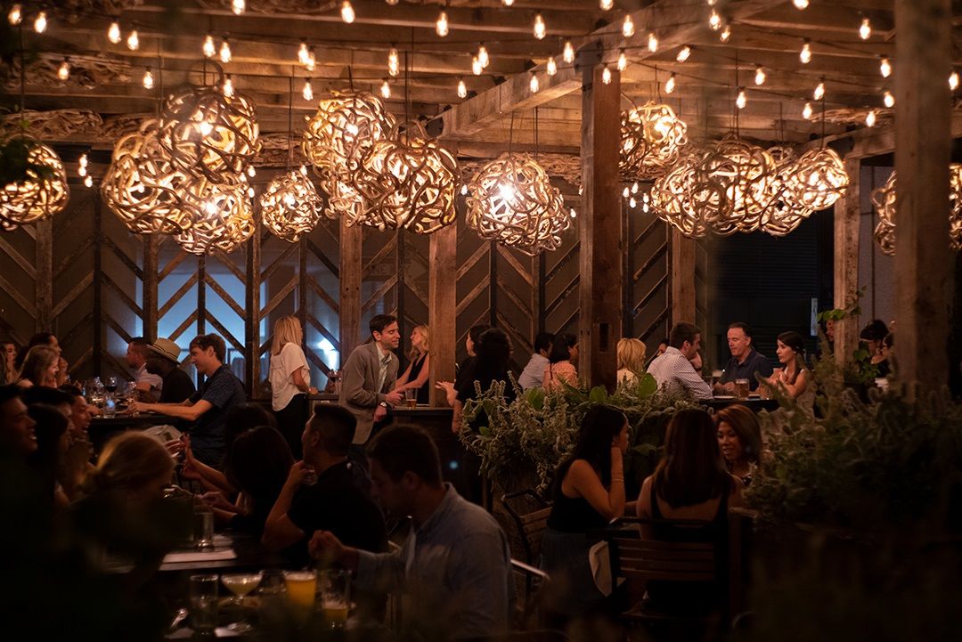 Harper's Garden restaurant interior with people dining
