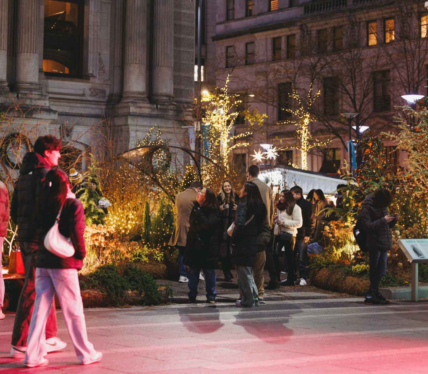 People enjoying the wintergarden decor and walking by.
